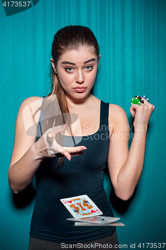 Image of sexy woman with poker cards