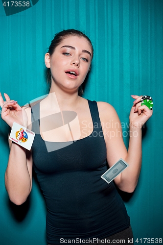 Image of sexy woman with poker cards