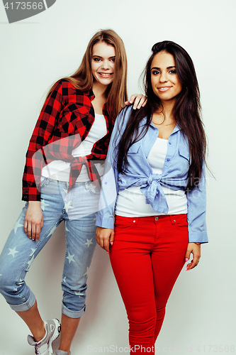 Image of best friends teenage girls together having fun, posing emotional on white background, besties happy smiling, lifestyle people concept, blond and brunette multi nations 