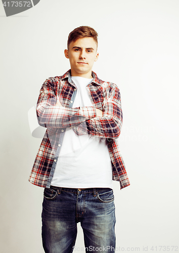Image of young handsome teenage hipster guy posing emotional, happy smiling against white background isolated, lifestyle people concept