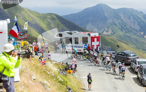 Image of The Peloton in Mountains - Tour de France 2015