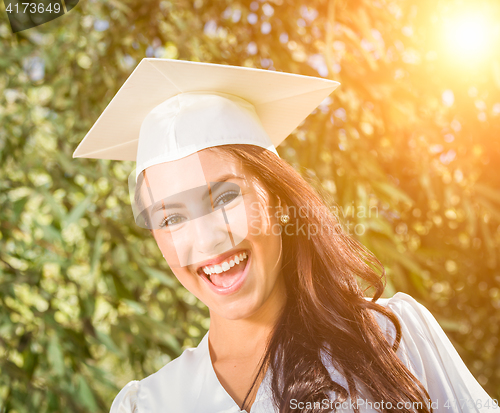 Image of Happy Graduating Mixed Race Girl In Cap and Gown
