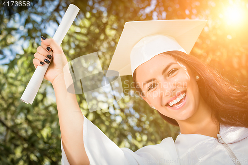 Image of Graduating Mixed Race Girl In Cap and Gown with Diploma