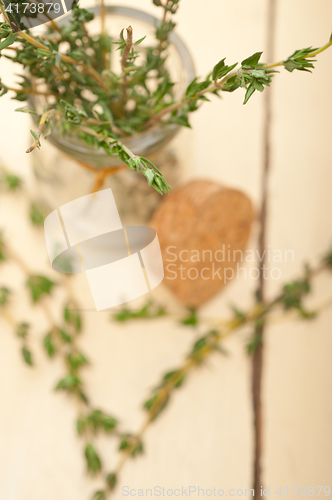 Image of fresh thyme on a glass jar