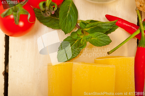 Image of Italian pasta paccheri with tomato mint and chili pepper