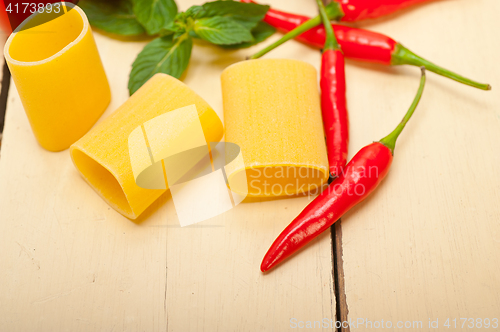 Image of Italian pasta paccheri with tomato mint and chili pepper