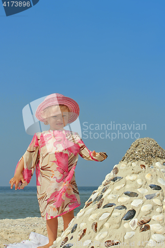 Image of Little girl on a sea beach