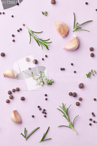 Image of spices on purple background
