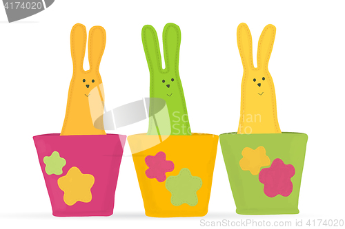 Image of Multicolored easter bunnies sitting in row