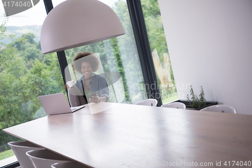 Image of African American woman in the living room