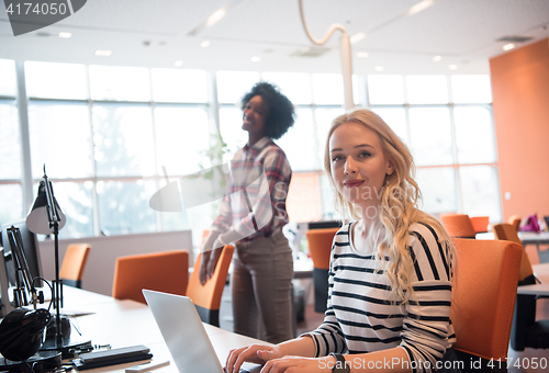 Image of informal business woman working in the office