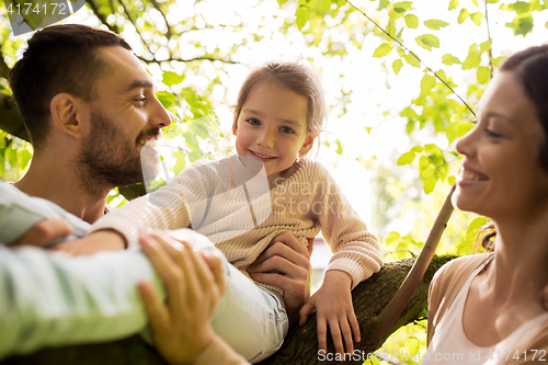 Image of happy family in summer park having fun