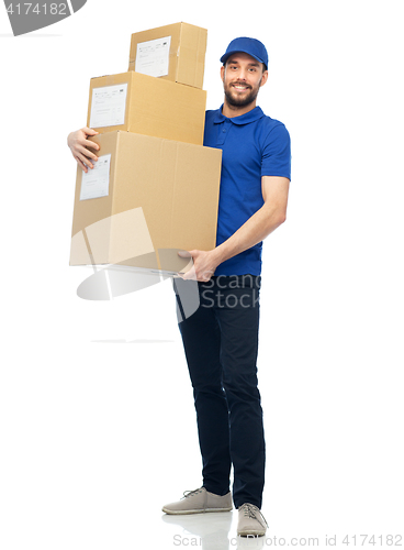 Image of happy delivery man with parcel boxes