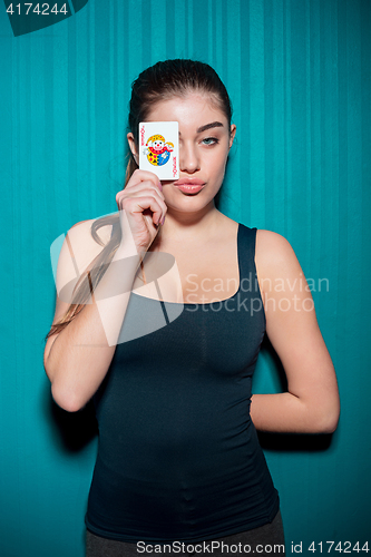 Image of sexy woman with poker cards