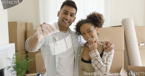 Image of Proud young African American couple with keys