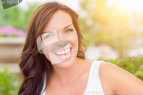 Image of Pretty Mixed Race Girl Portrait Outdoors