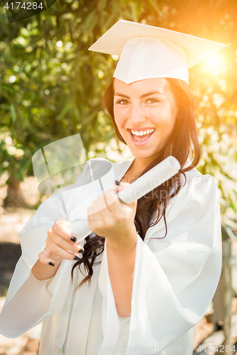 Image of Graduating Mixed Race Girl In Cap and Gown with Diploma