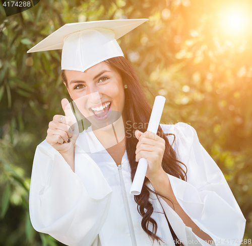 Image of Graduating Mixed Race Girl In Cap and Gown with Diploma