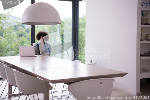 Image of African American woman in the living room