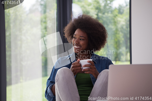 Image of African American woman in the living room