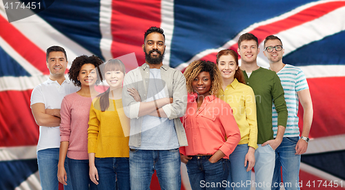 Image of international group of people over british flag