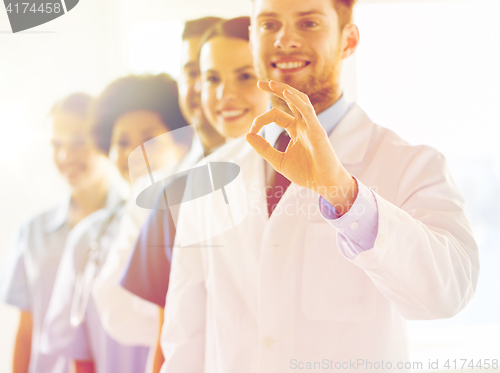 Image of close up of doctors showing ok sign at hospital