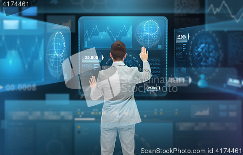 Image of businessman working with virtual screens