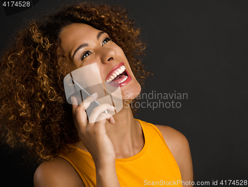 Image of On the phone with her Best Friend