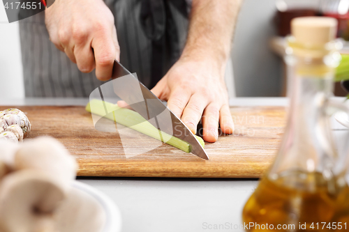 Image of Cutting vegetables.