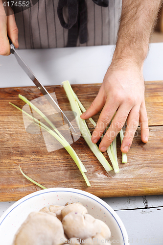 Image of Cutting vegetables. Slicing knife vegetables.