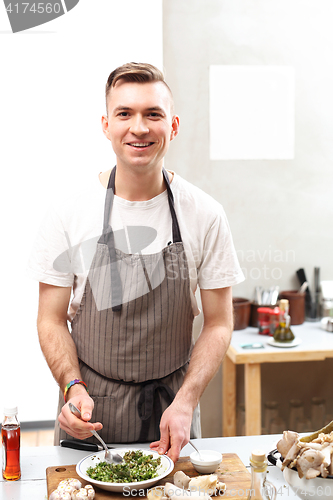 Image of Green diet. The cook prepares the dish. 