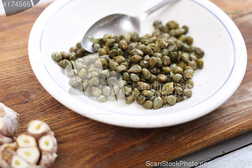 Image of Capers. Vegetables in the kitchen 