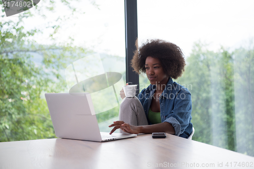 Image of African American woman in the living room