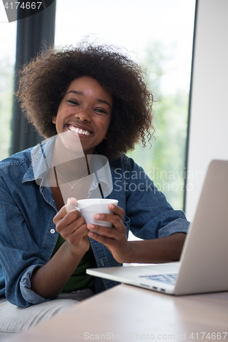 Image of African American woman in the living room