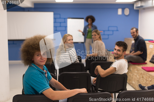 Image of Portrait of young informal businessman