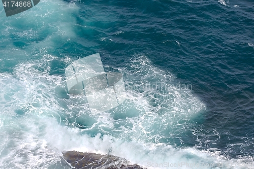 Image of Waves hitting shore