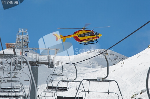 Image of Rescue helicopter in the mountains