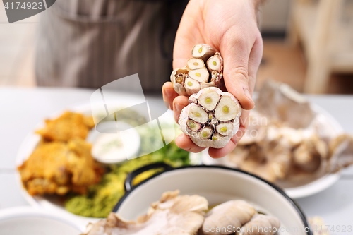 Image of Healthy kitchen, garlic in the kitchen