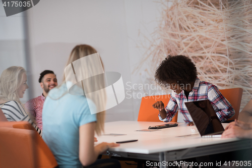 Image of Multiethnic startup business team on meeting