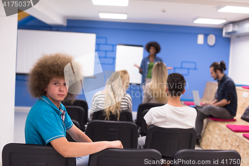 Image of Portrait of young informal businessman