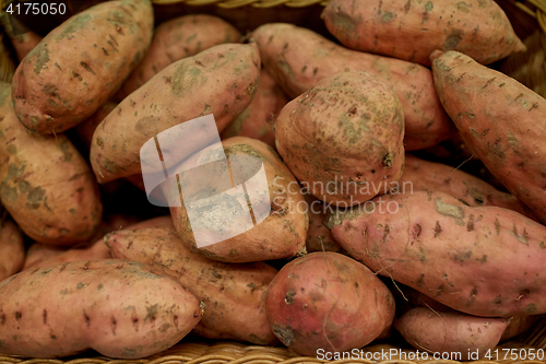 Image of close up of sweet potatoes in basket
