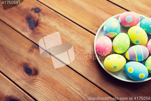 Image of close up of colored easter eggs on plate