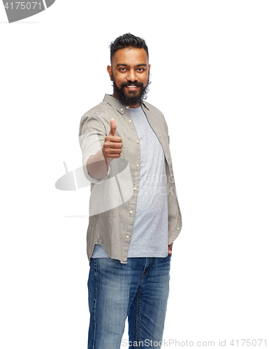 Image of happy indian man showing thumbs up over white