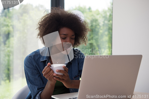 Image of African American woman in the living room