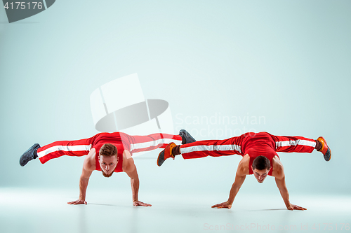 Image of The two gymnastic acrobatic caucasian men