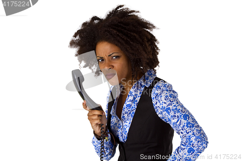 Image of Angry african american woman with handset