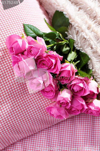 Image of pink roses on pillow