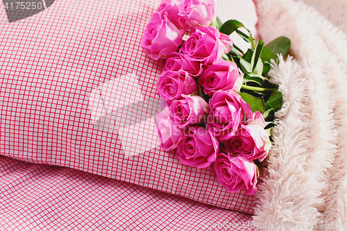 Image of pink roses on pillow