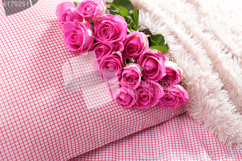 Image of pink roses on pillow