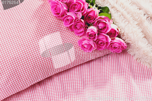 Image of pink roses on pillow
